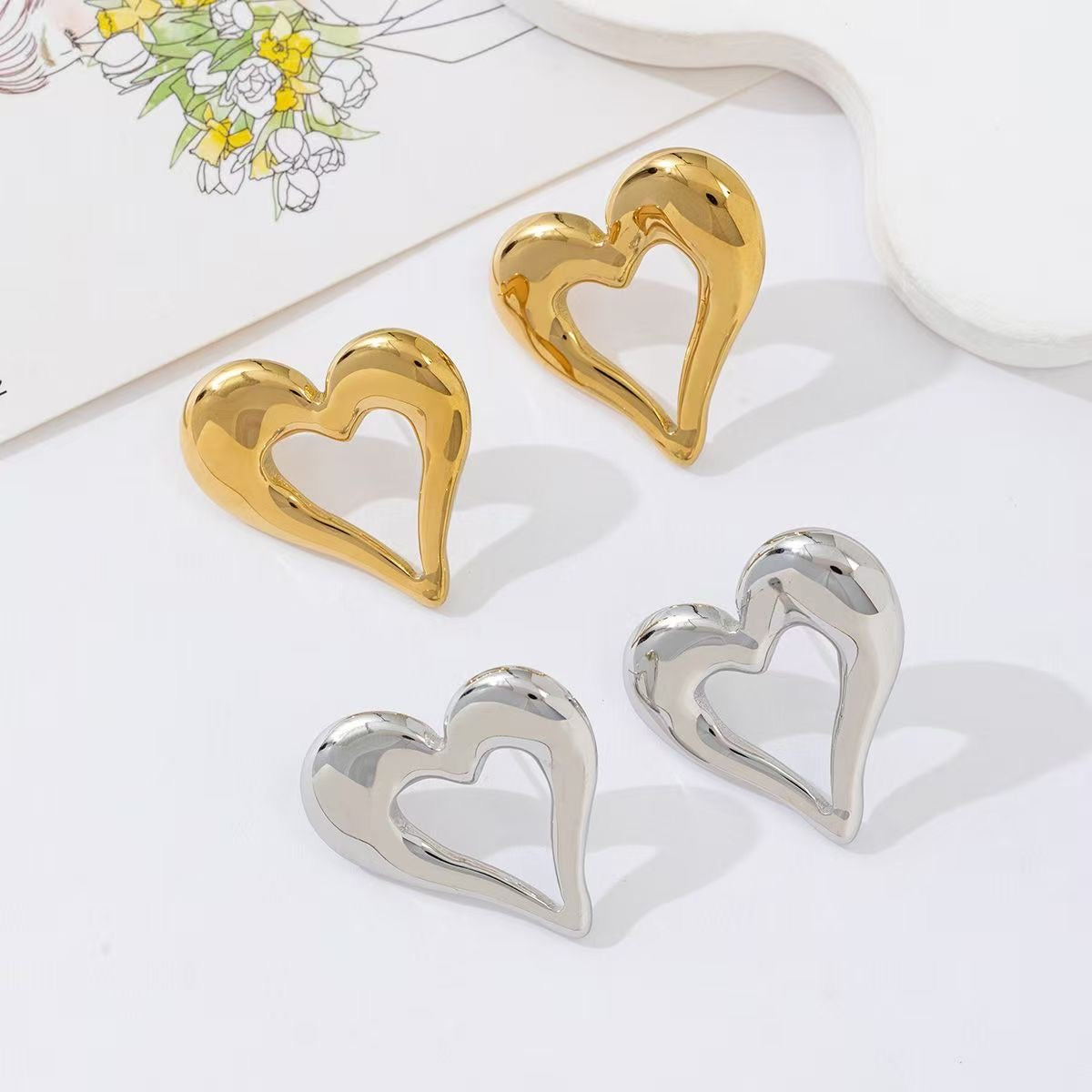 Open heart stud earrings