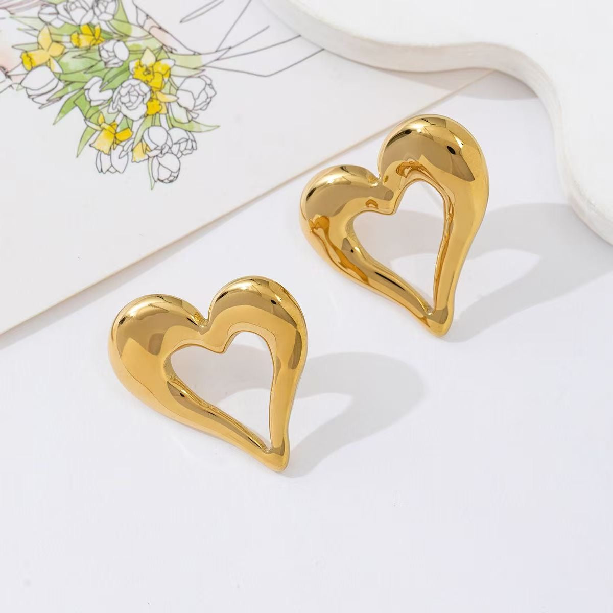 Open heart stud earrings