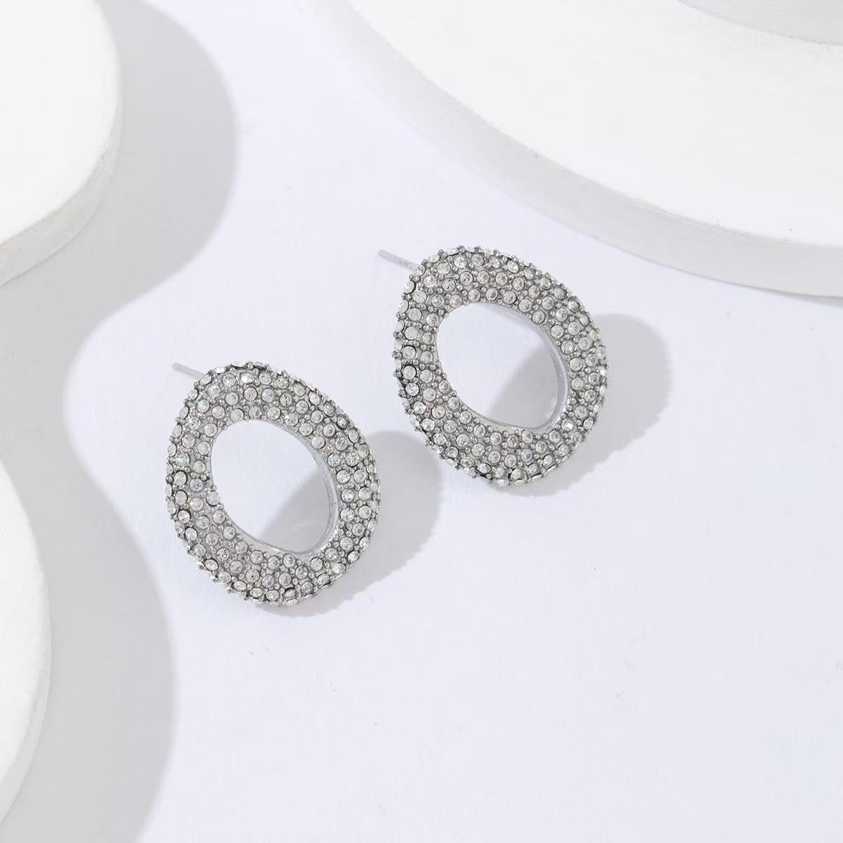 Open rhinestone stud earrings