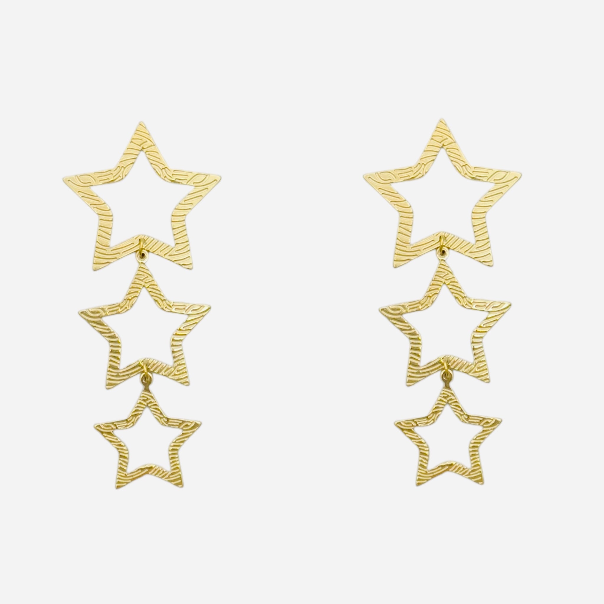 Open star statement earrings