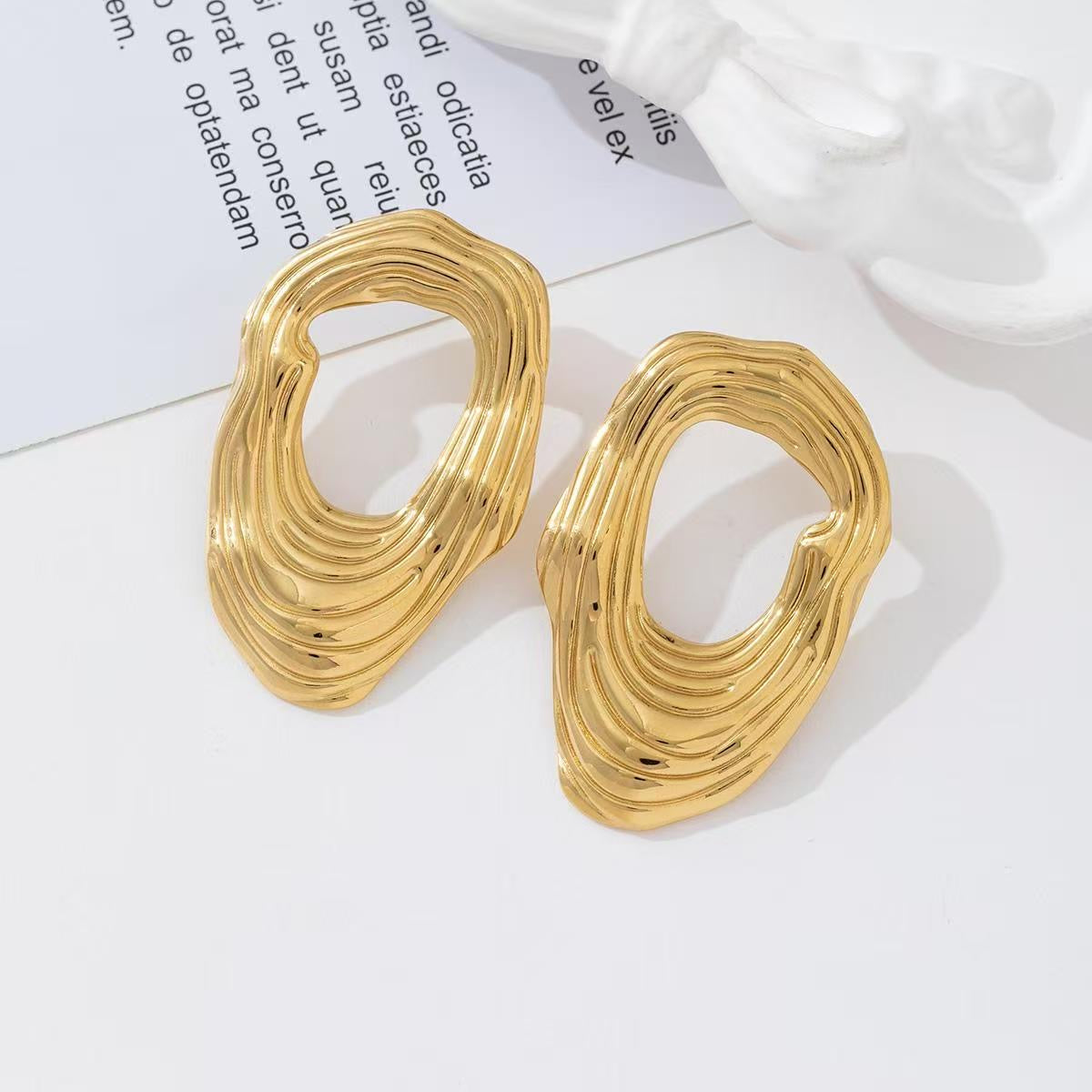 Fly stud earrings