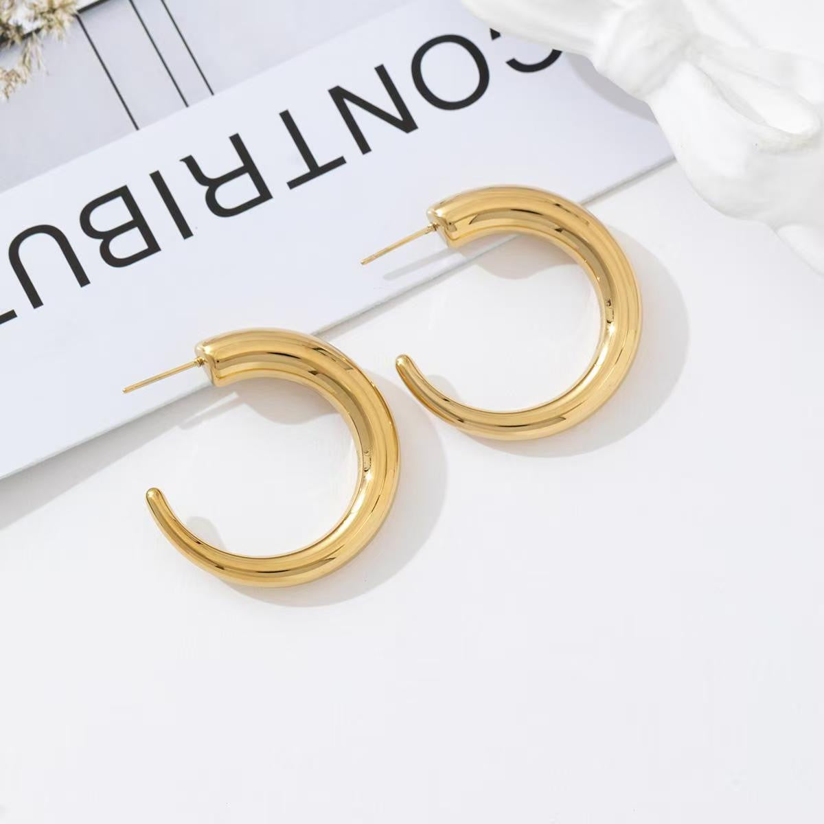 Open roundy hoops earrings