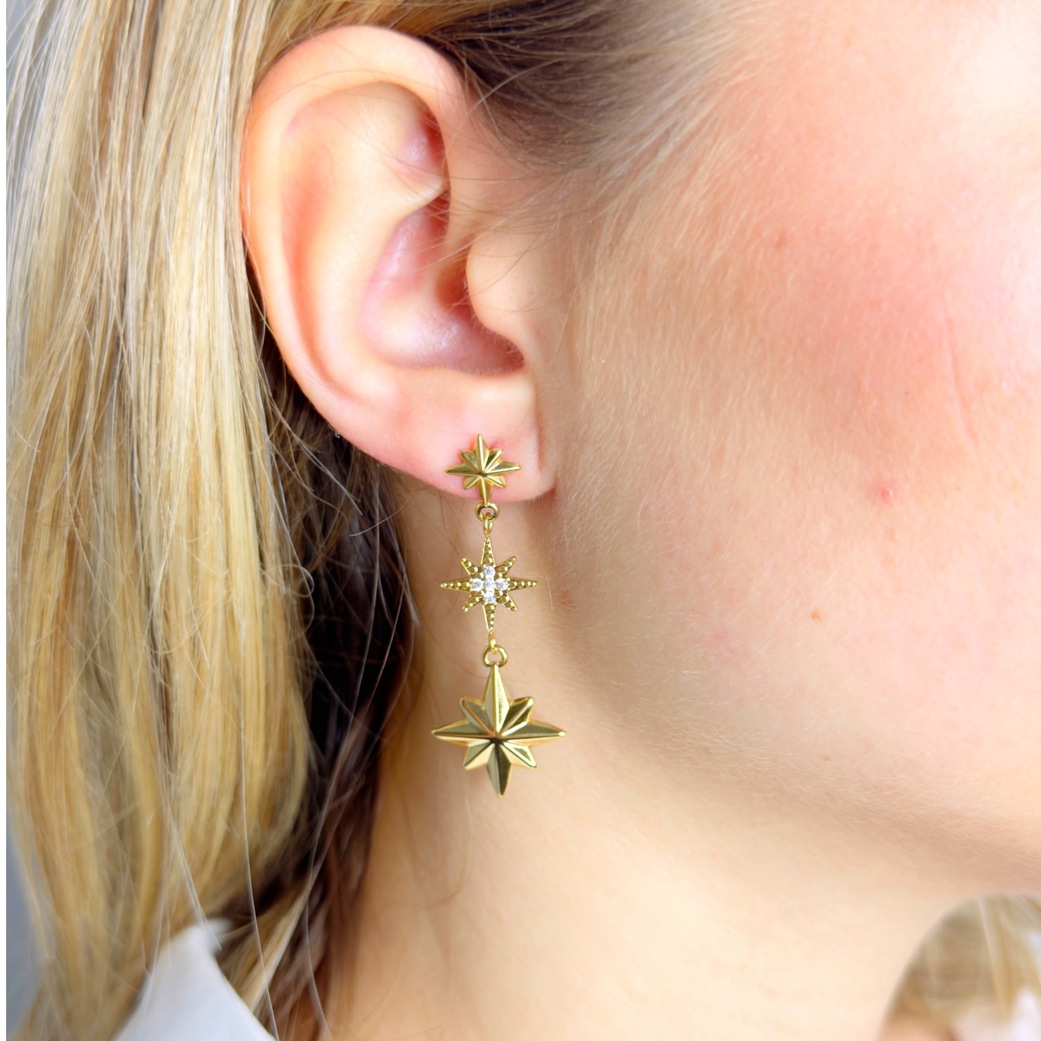 Dangling star rhinestone earrings