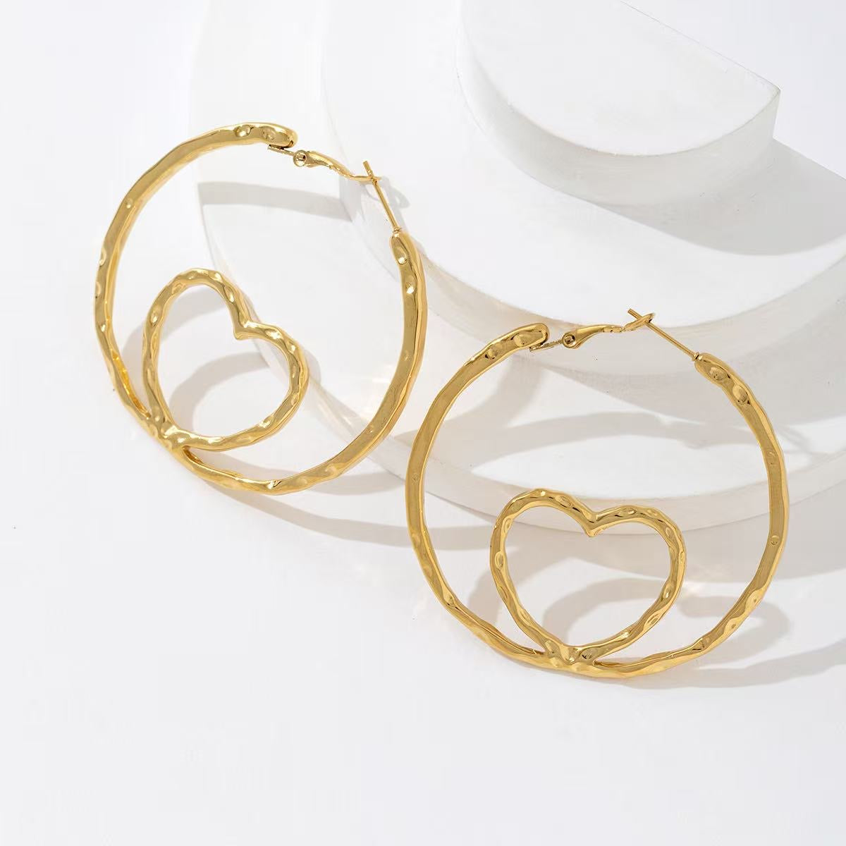 Heartless hoops earrings