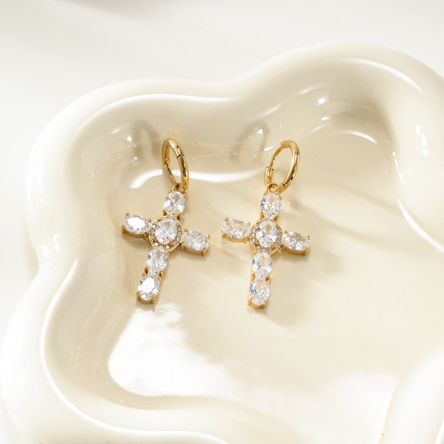 Believer dangle earrings