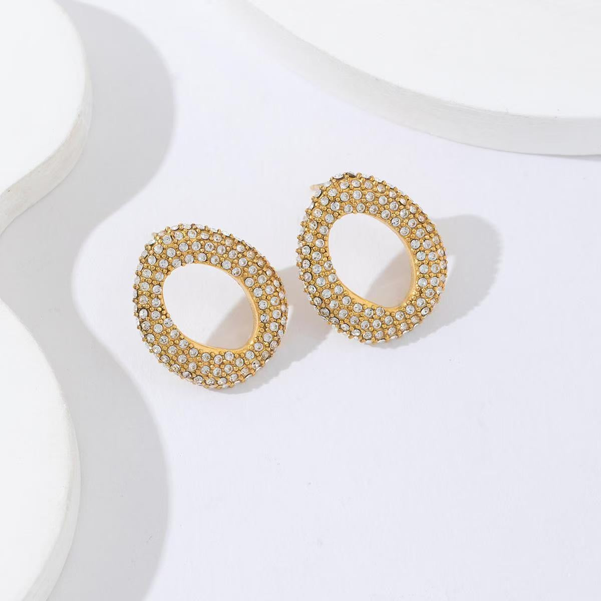 Open rhinestone stud earrings