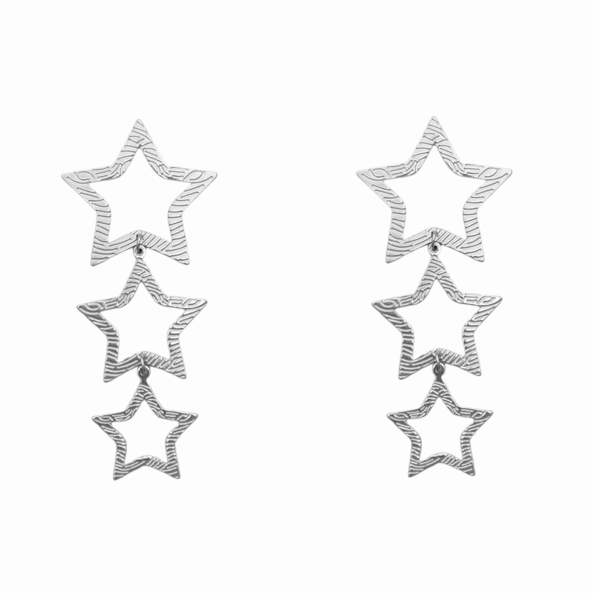 Open star statement earrings