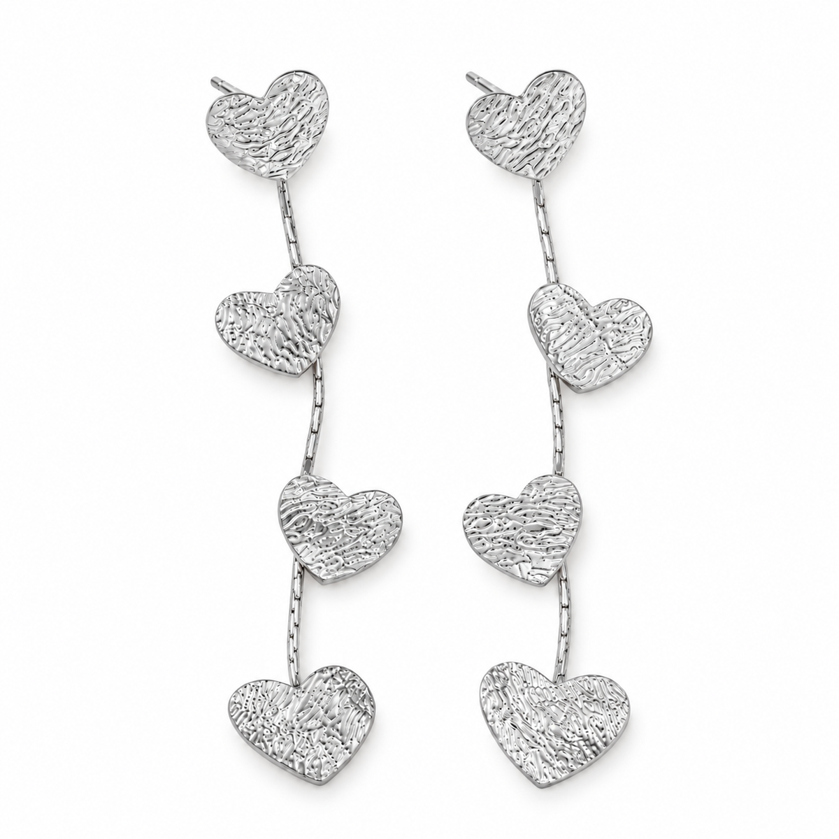 Hanging hearts statement oorbellen