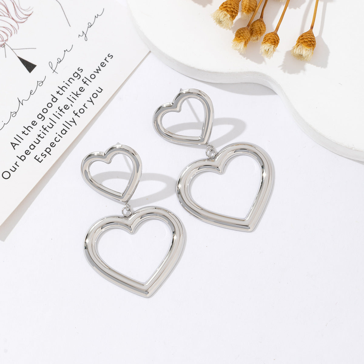 Open heart statement earring