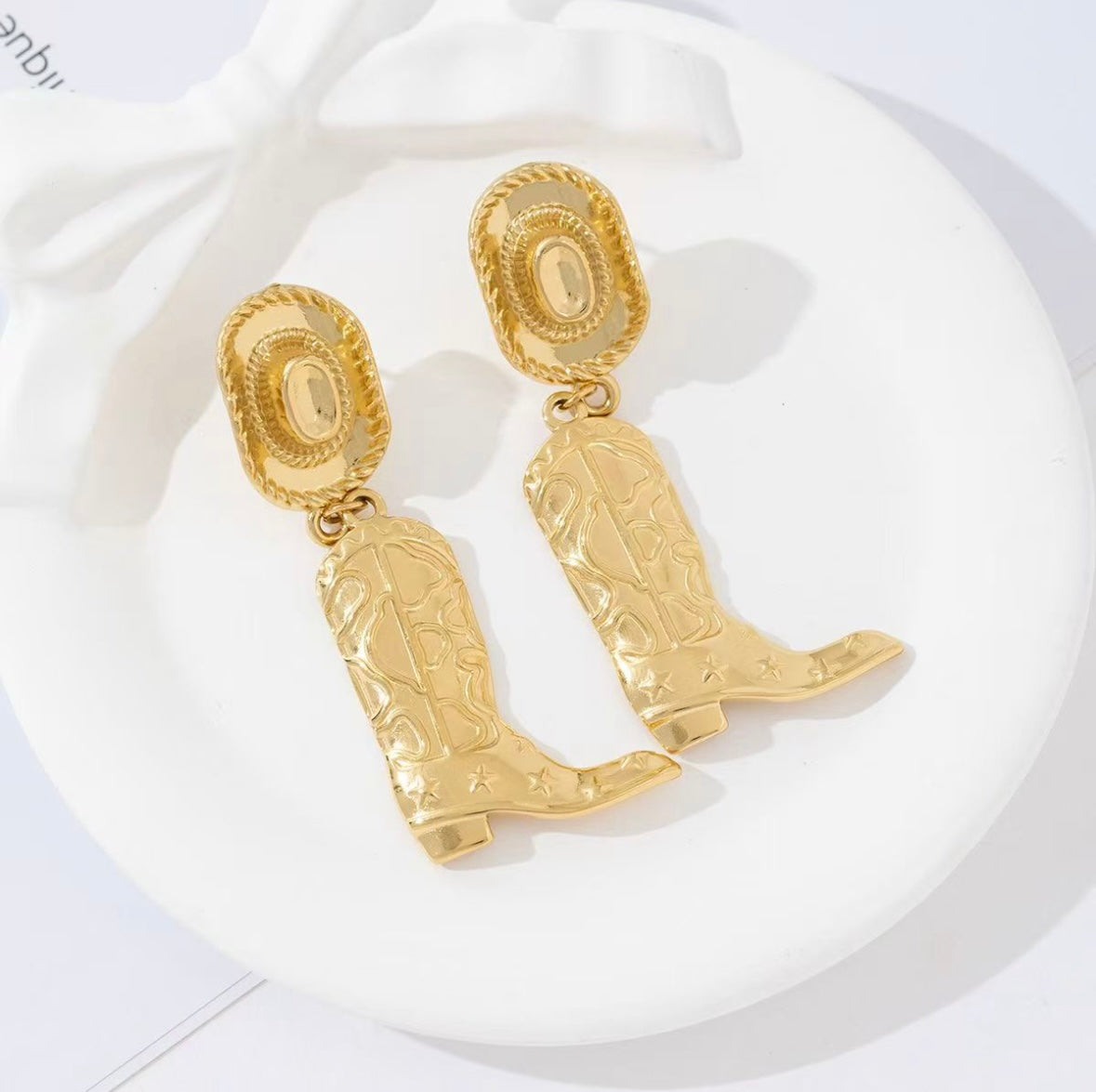 Biba hawk statement earrings