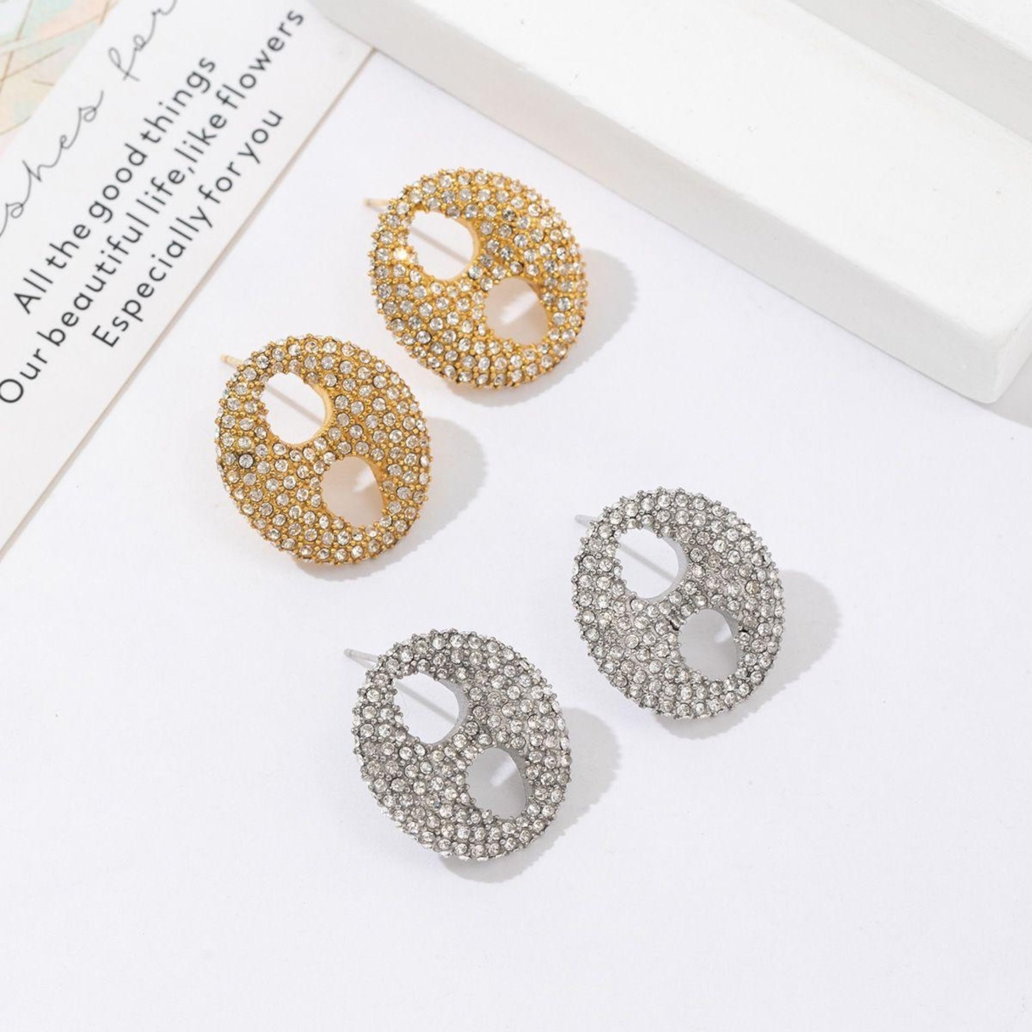 Strassy peace stud earrings