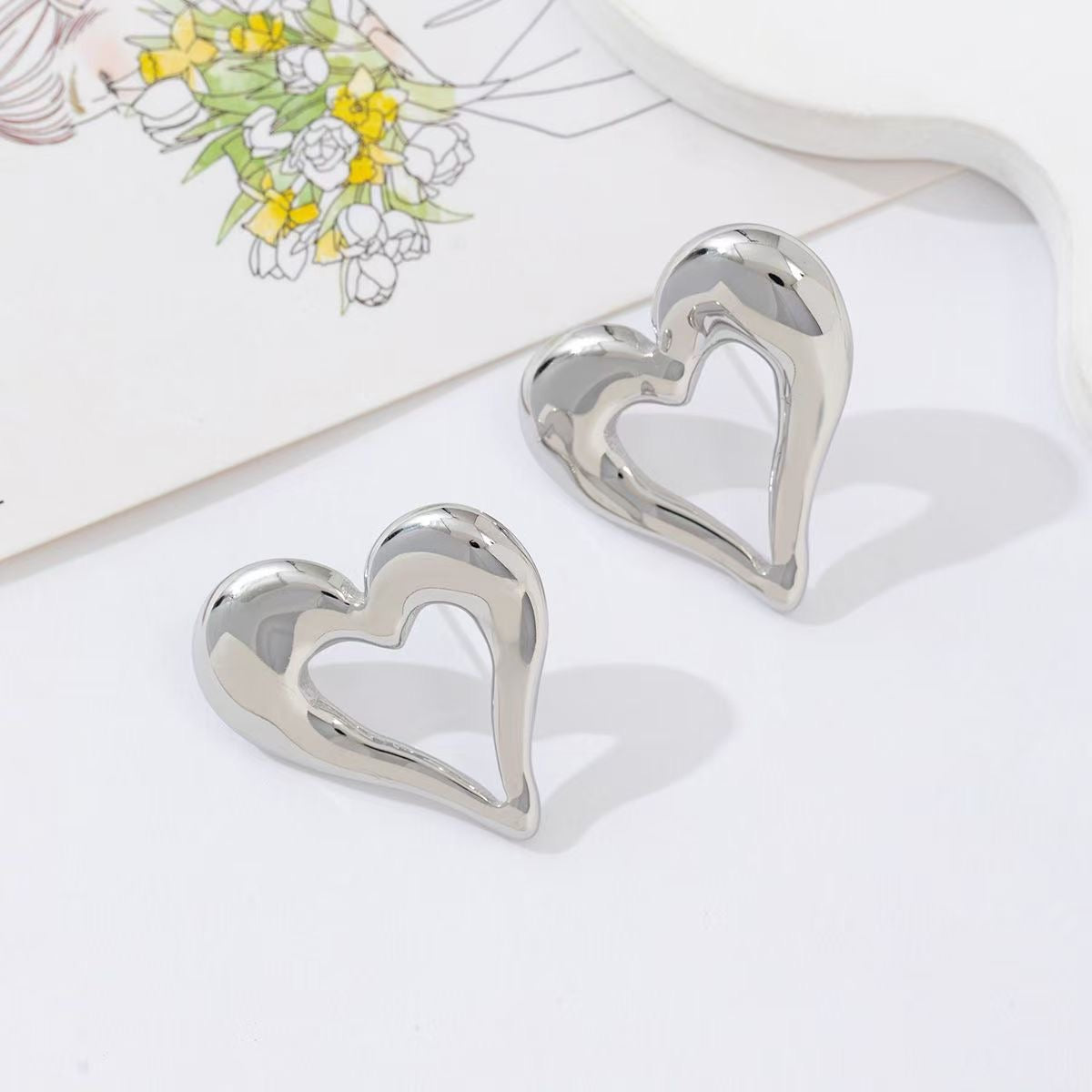Open heart stud earrings