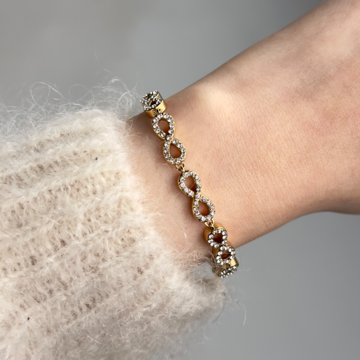 Infinity strass armband Goud SOFIZARE