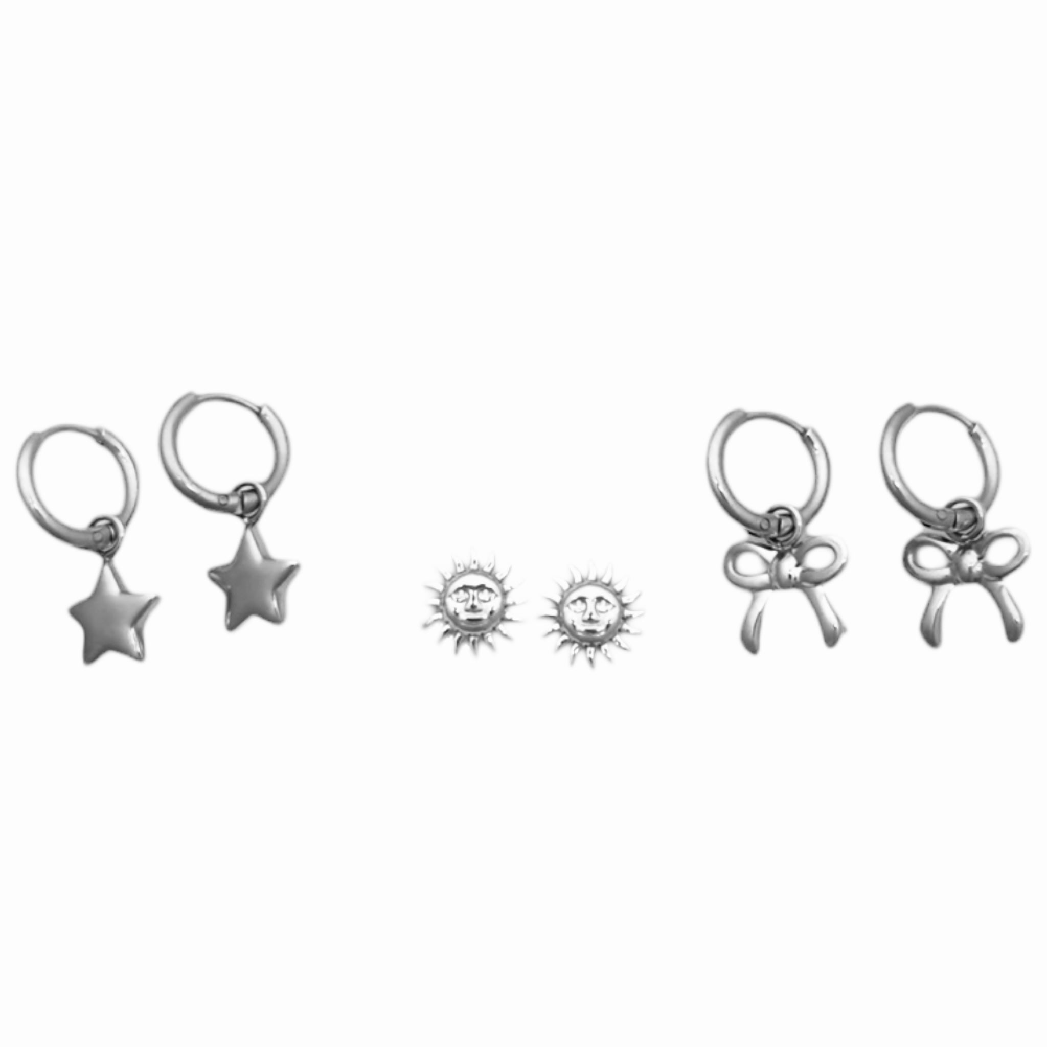 Earring set of stars, suns and bow