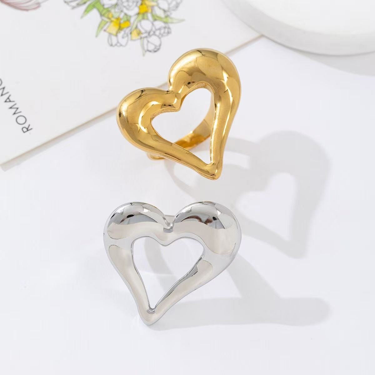 Open hearts ring