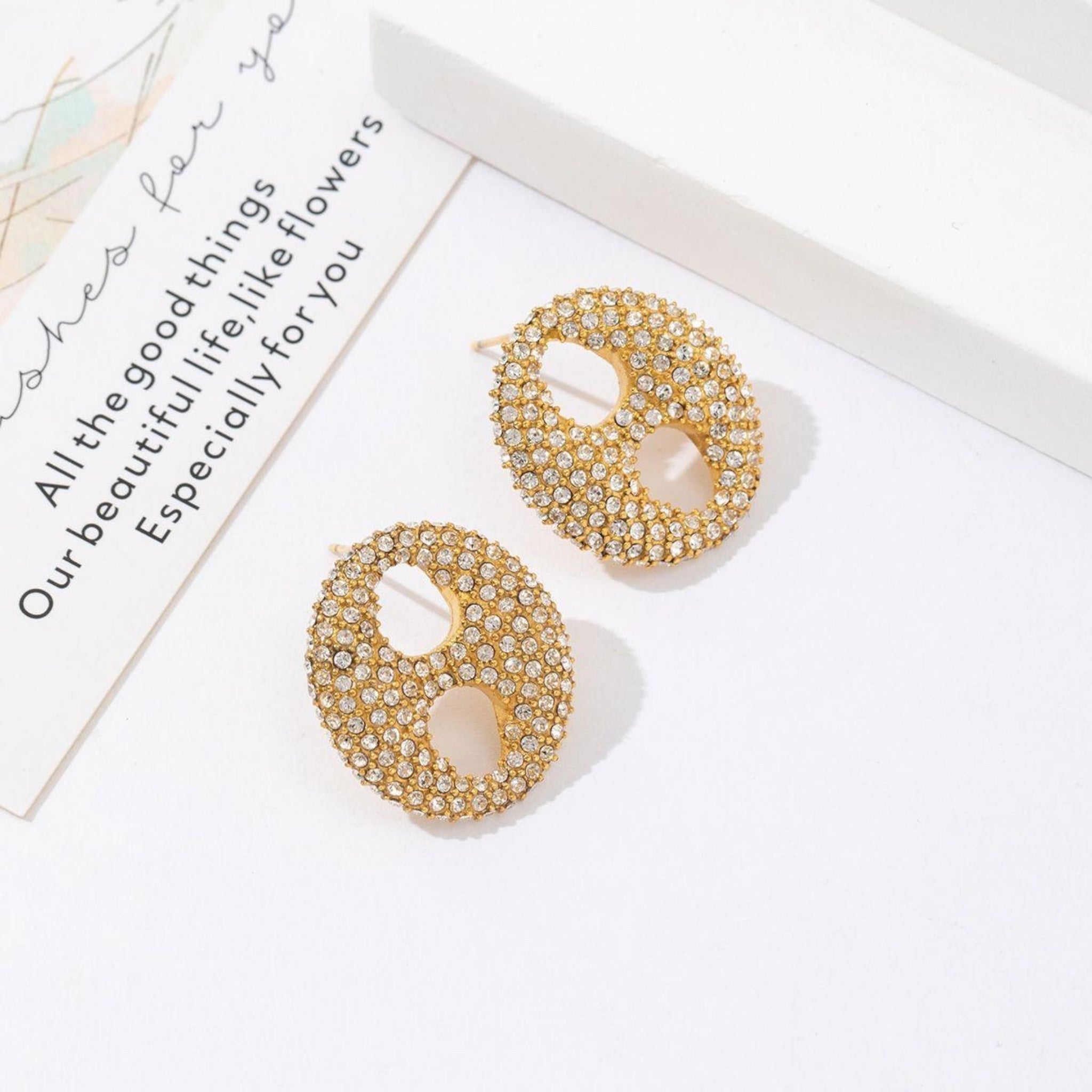 Strassy peace stud earrings