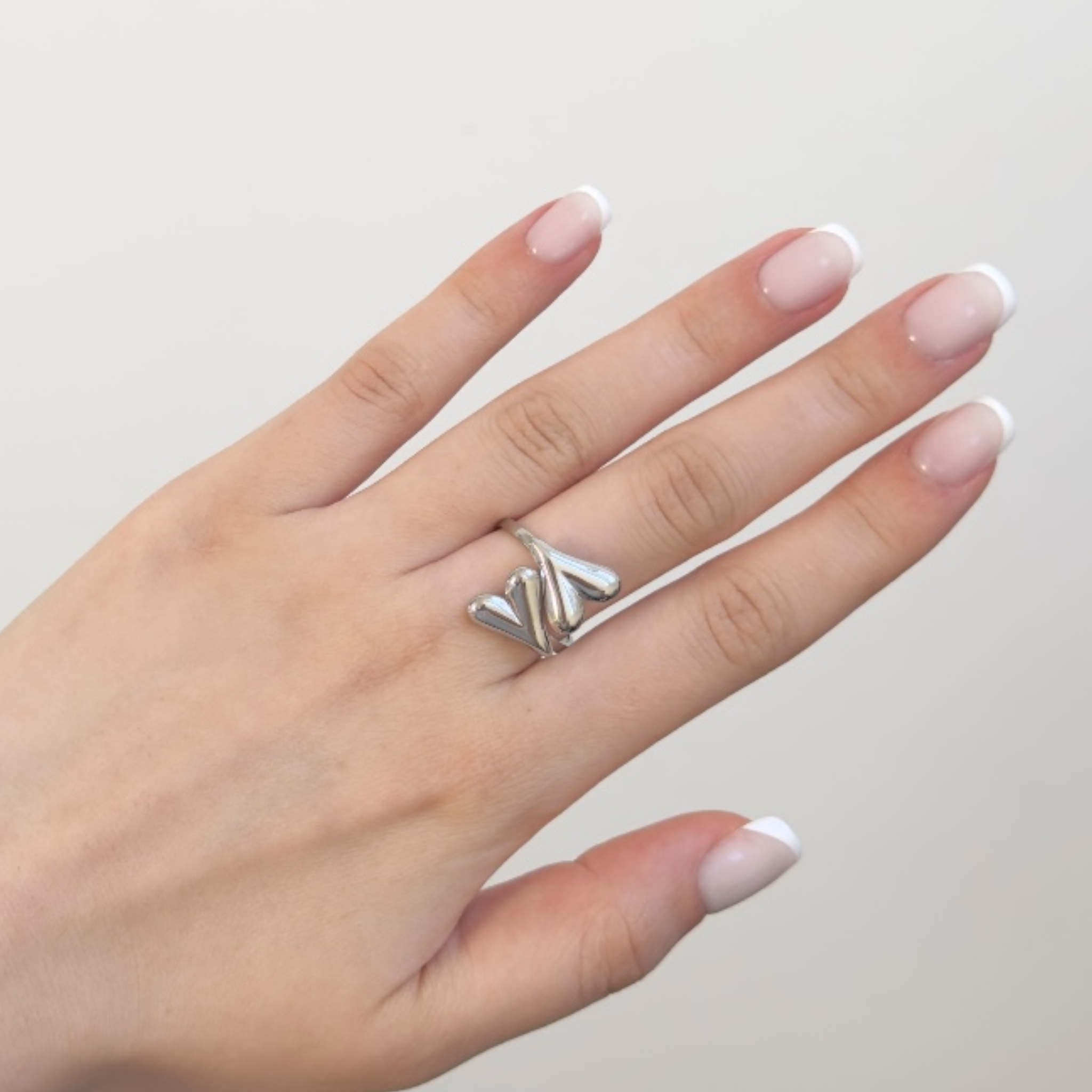 Twisted pointed heart ring