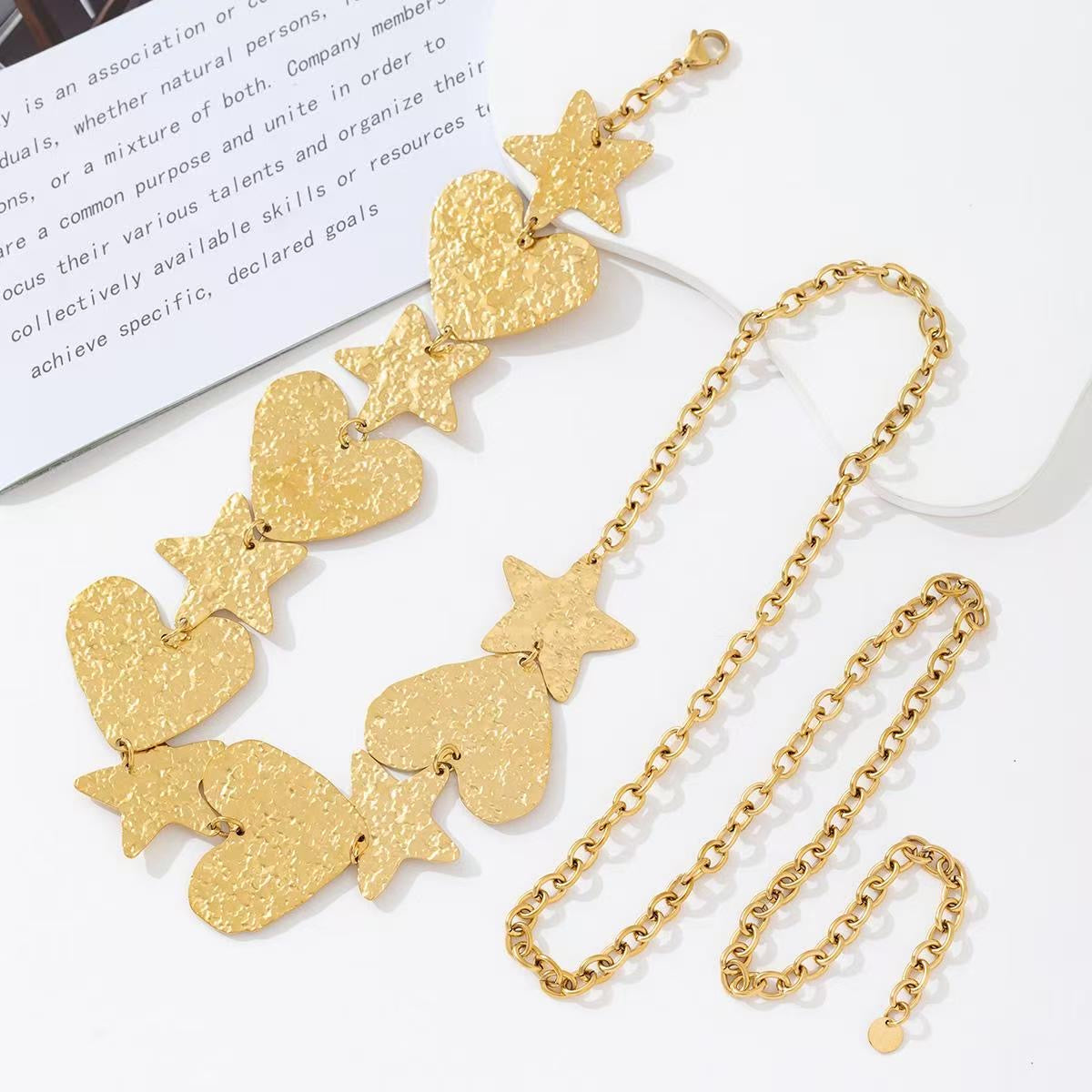 Statement spikey belly chain